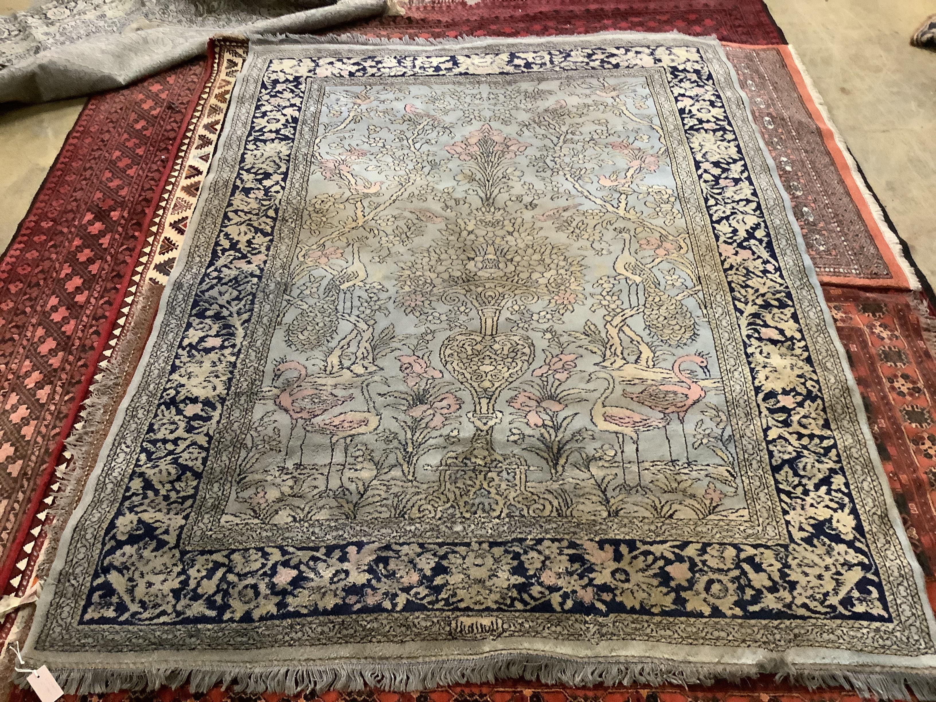 Two Persian style pale blue ground carpets, 239 x 170cm and 170 x 123cm